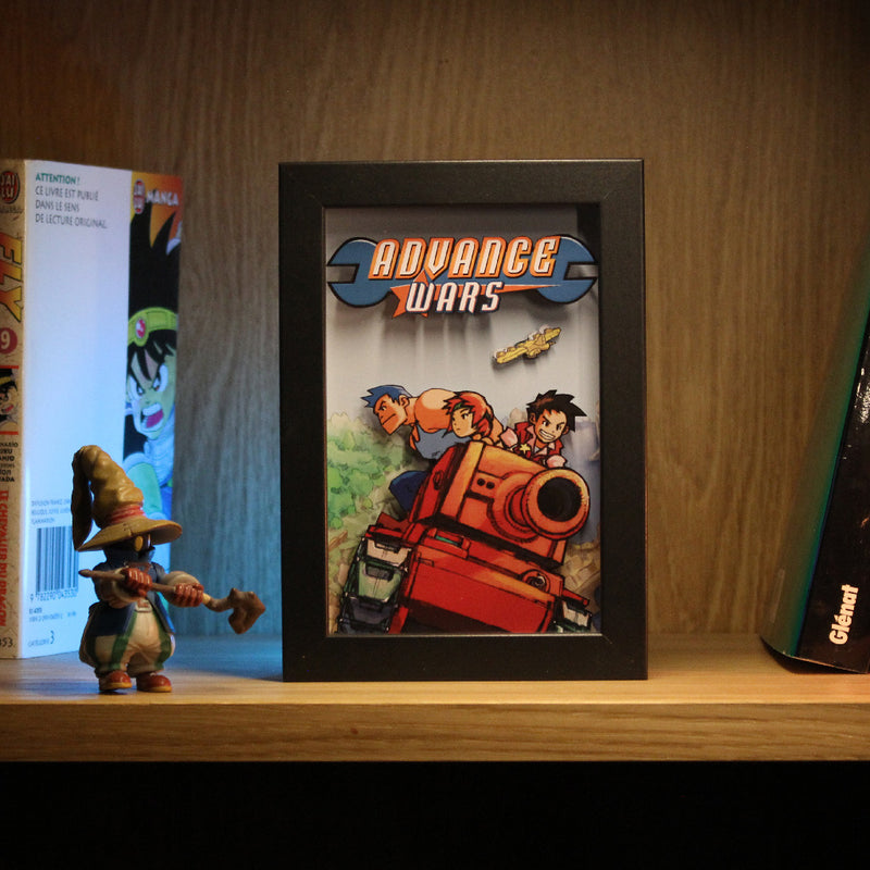 Diorama lumineux Advance Wars posé sur une étagère, cadre noir avec artwork Game Boy Advance